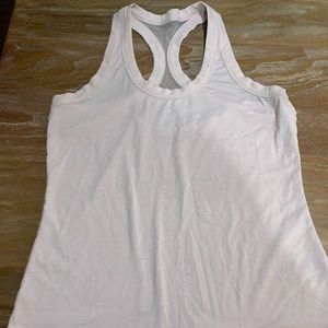Pale pink Athleta tank.